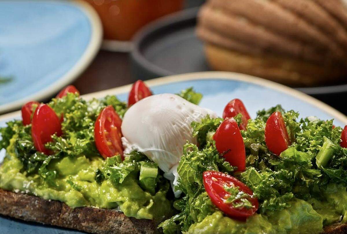 Avocado toast with cherry tomatoes and a poached egg, from the menu at the new Don Artemio restaurant.