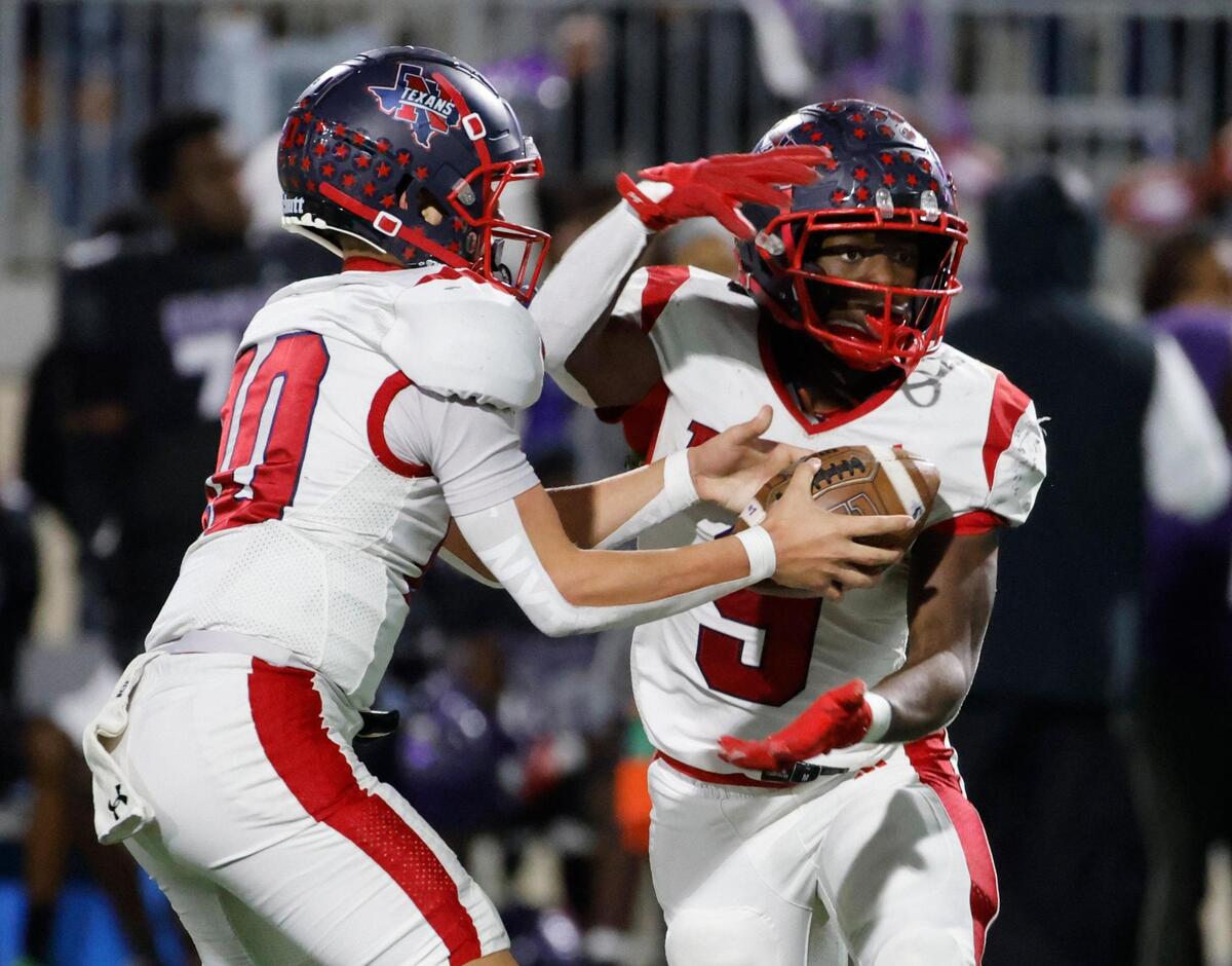 Northwest quarterback Trey Poe (10) hands the ball to running back Nate Jean (9) during a UIL Class 6A D2 Bi-district playoff football game at Crowley ISD Multi-Purpose Stadium in Fort Worth, Texas, Friday, Nov. 15, 2024.