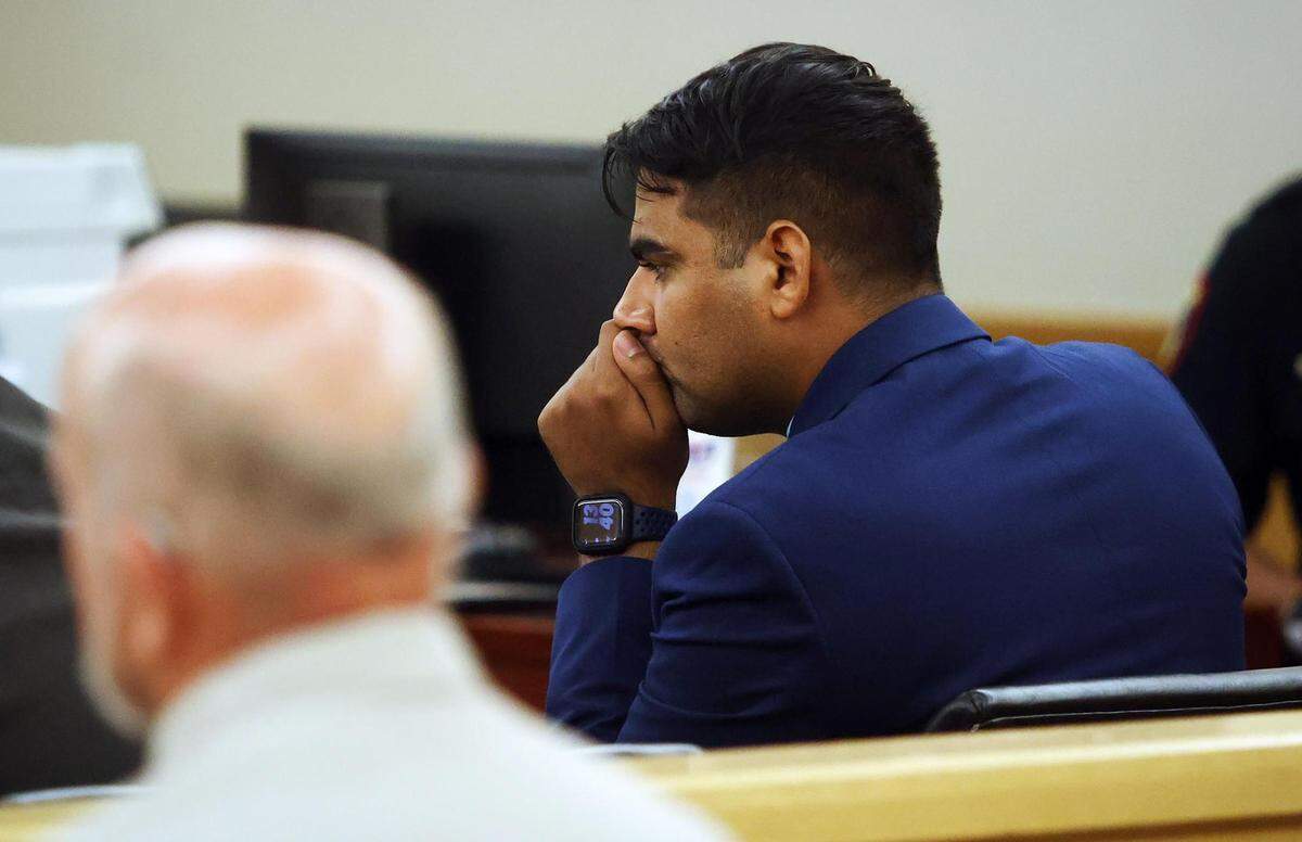 Former Arlington Police Department Officer Ravinder Singh listens as the state calls witnesses to testify on the first day of trial on Tuesday, Aug. 23, 2022. Singh is accused of criminally negligent homicide in the 2019 shooting death of Margarita Brooks.