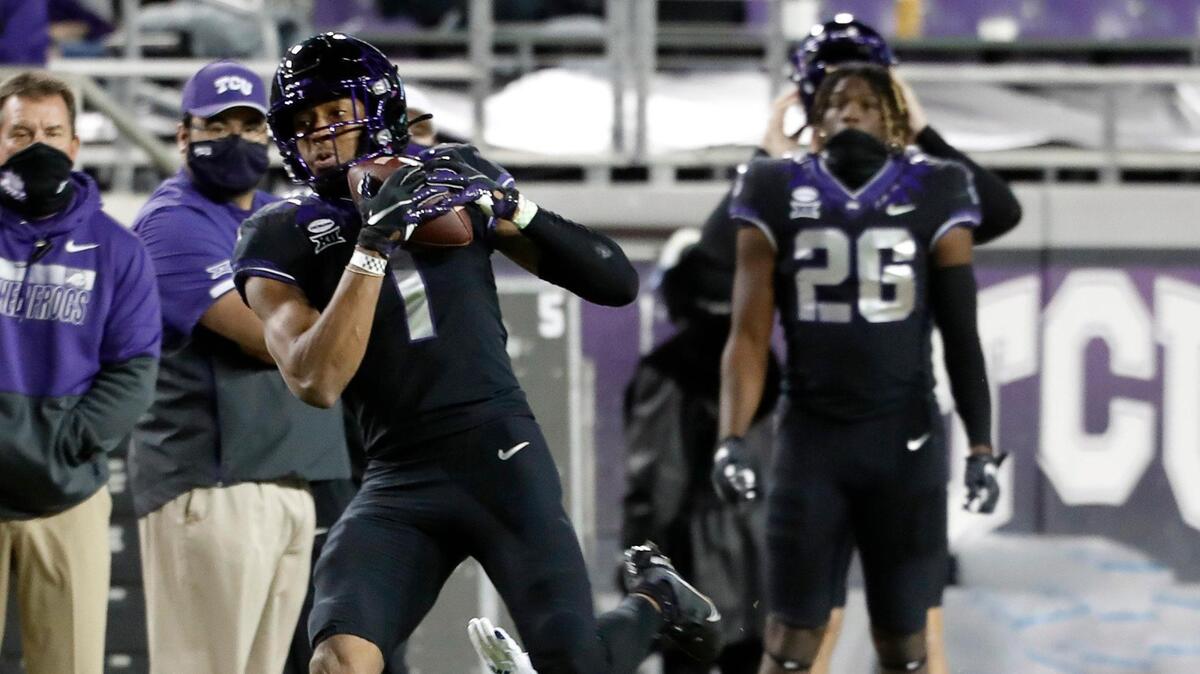 TCU wide receiver Quentin Johnston takes the ball to the house during the first half at Amon G. Carter Stadium in Fort Worth, Texas, Saturday, Dec. 12, 2020. TCU defeated Louisiana Tech on Saturday night.