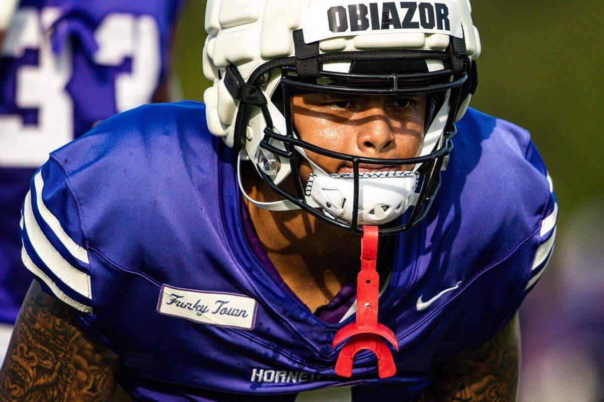 TCU linebacker Namdi Obiazor is older — but smaller — than his younger brother, Kansas State defensive end Chiddi Obiazor.