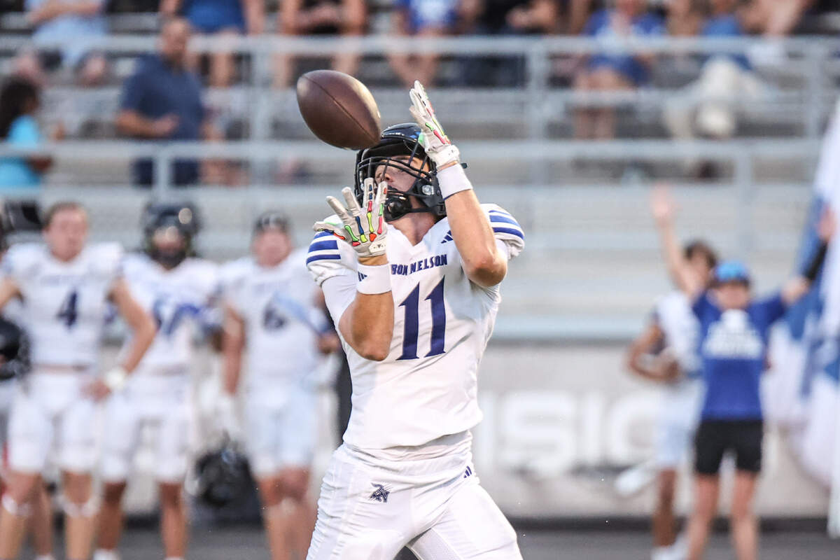 Byron Nelson receiver Nolan Hawkins catches a touchdown pass at Max Goldsmith Stadium in Lewisville on Thursday, Sept. 5, 2025.