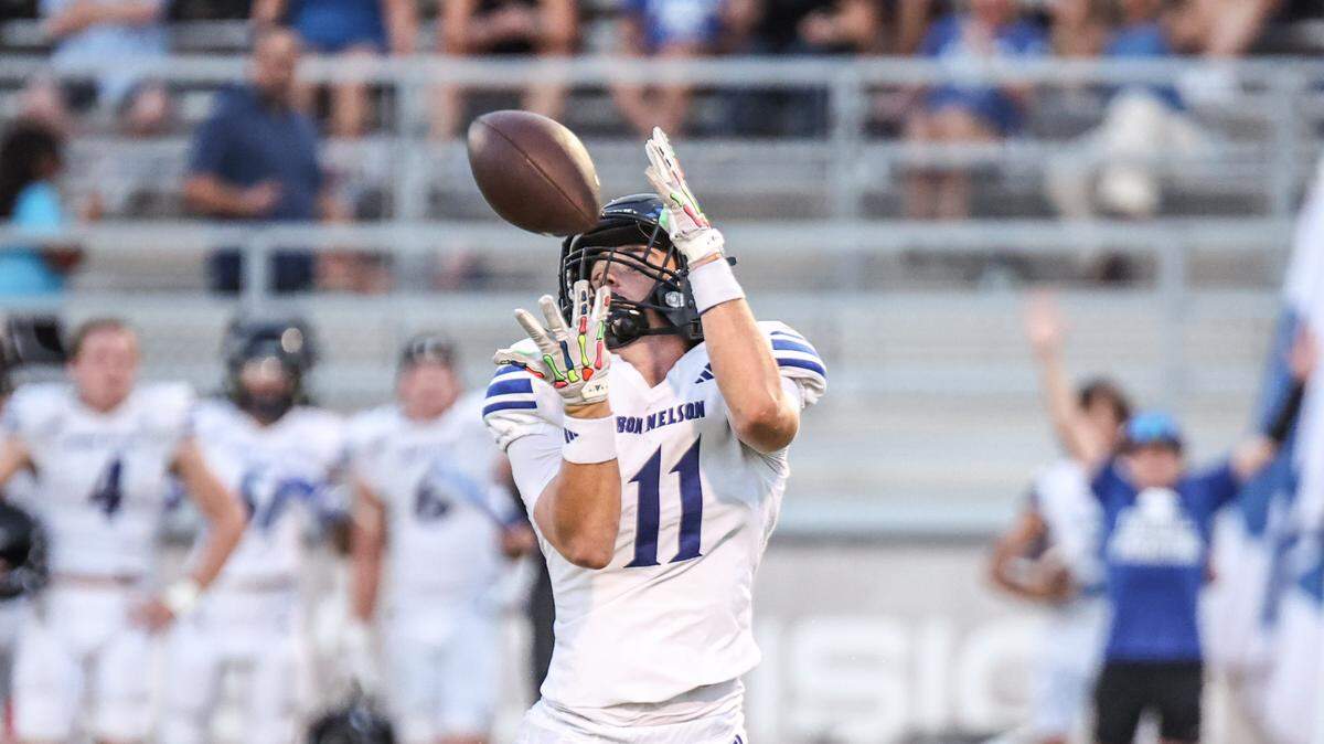 Byron Nelson receiver Nolan Hawkins catches a 58-yard touchdown pass at Max Goldsmith Stadium in Lewisville on Thursday, Sept. 5, 2025.