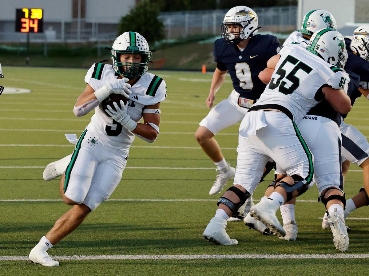 Carroll running back Davis Penn (3) takes it in for six in the first half of a UIL football game at Keller ISD Stadium in Keller, Texas, Thursday, Oct. 05, 2023.