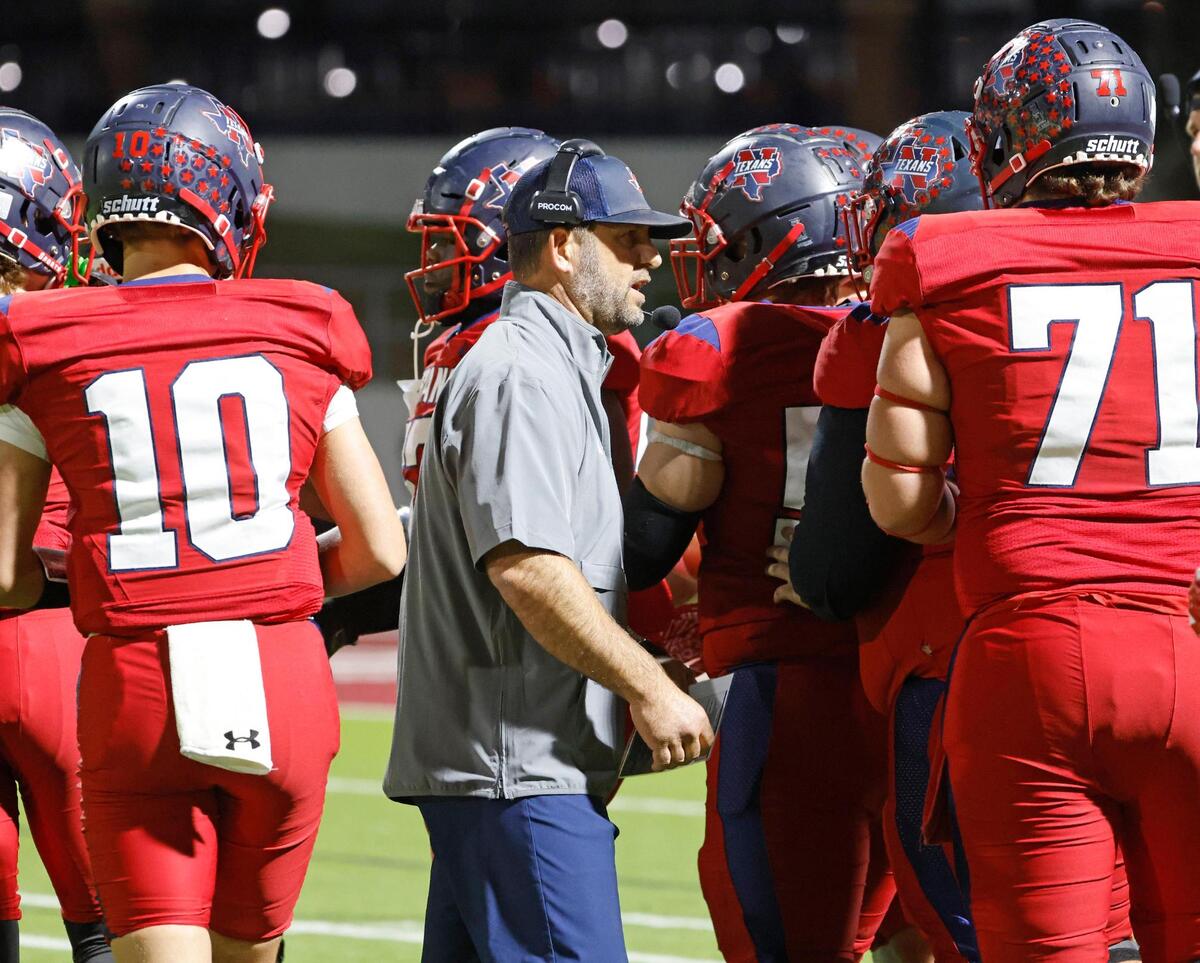 Northwest head coach Bill Poe talks to the team during a time out during a District 4 6A football game at Northwest ISD Stadium in Justin, Texas, Thursday, Oct. 17, 2024.