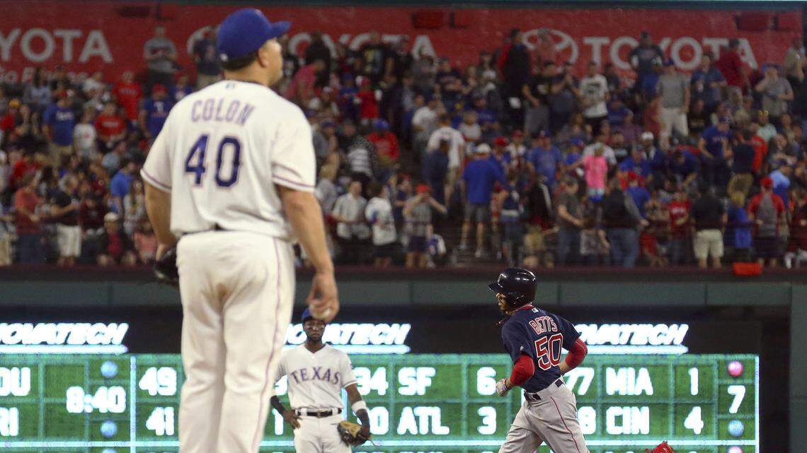 Mookie Betts hit one of the four Red Sox solo home runs Friday against Bartolo Colon, who lasted seven innings.