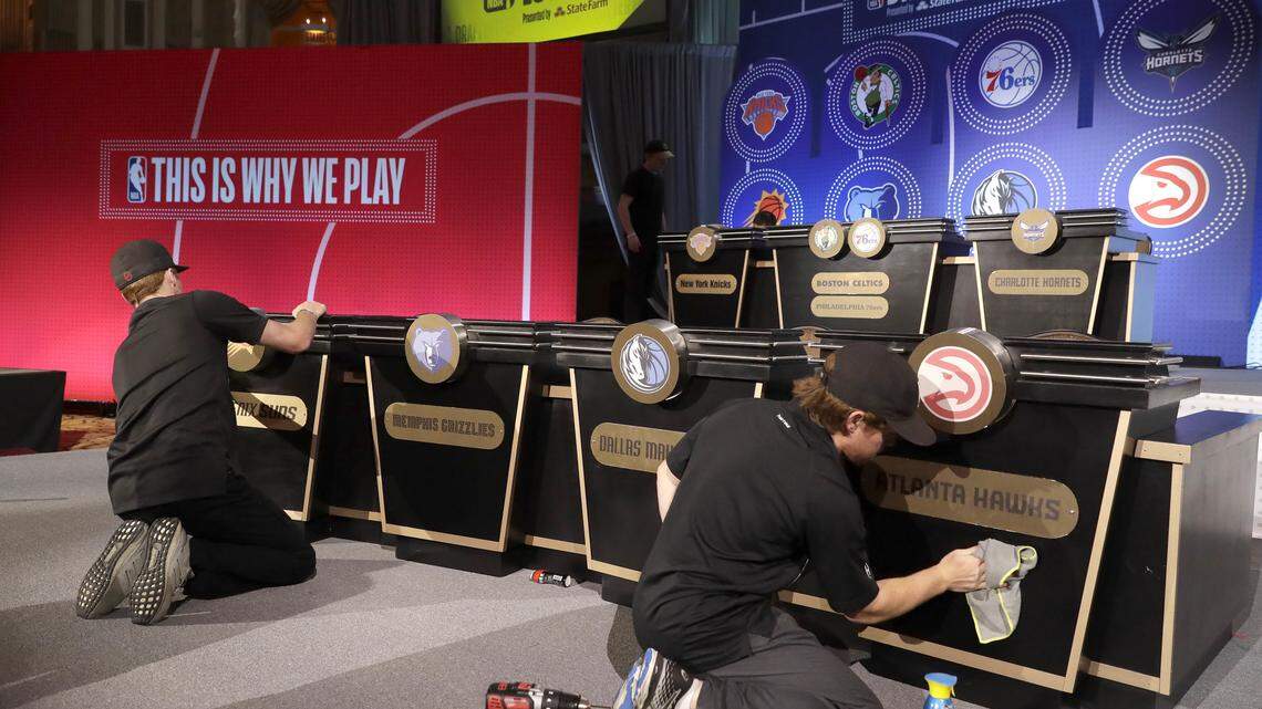 Stage hands prepare the set for the NBA draft lottery show that aired on ESPN Tuesday night.