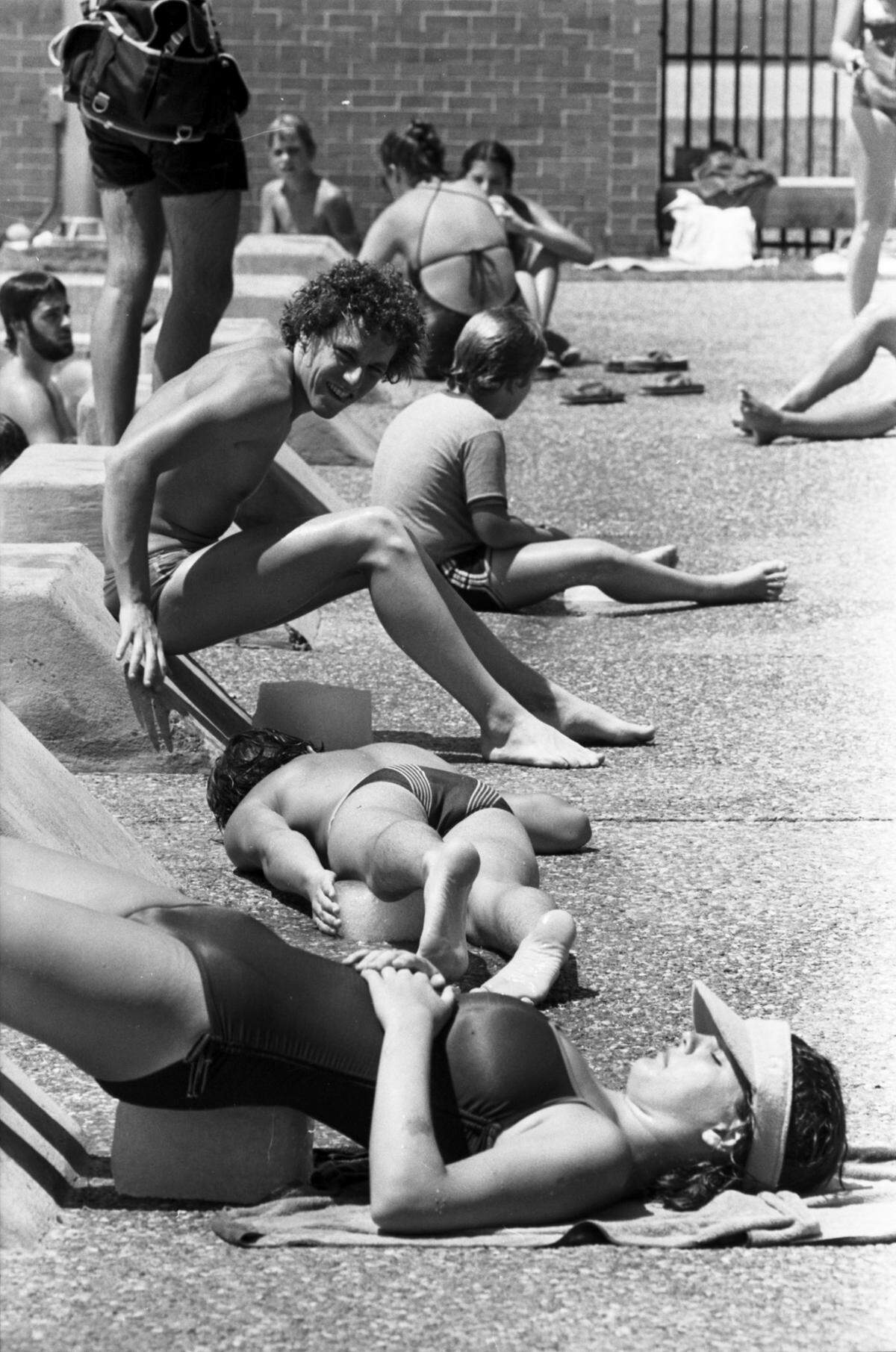 June 27, 1980: University of Texas at Arlington students attempt to melt 10-pound blocks of ice during a contest at the Non-Invitational Belly Flop and George Hamilton Tan Competition.