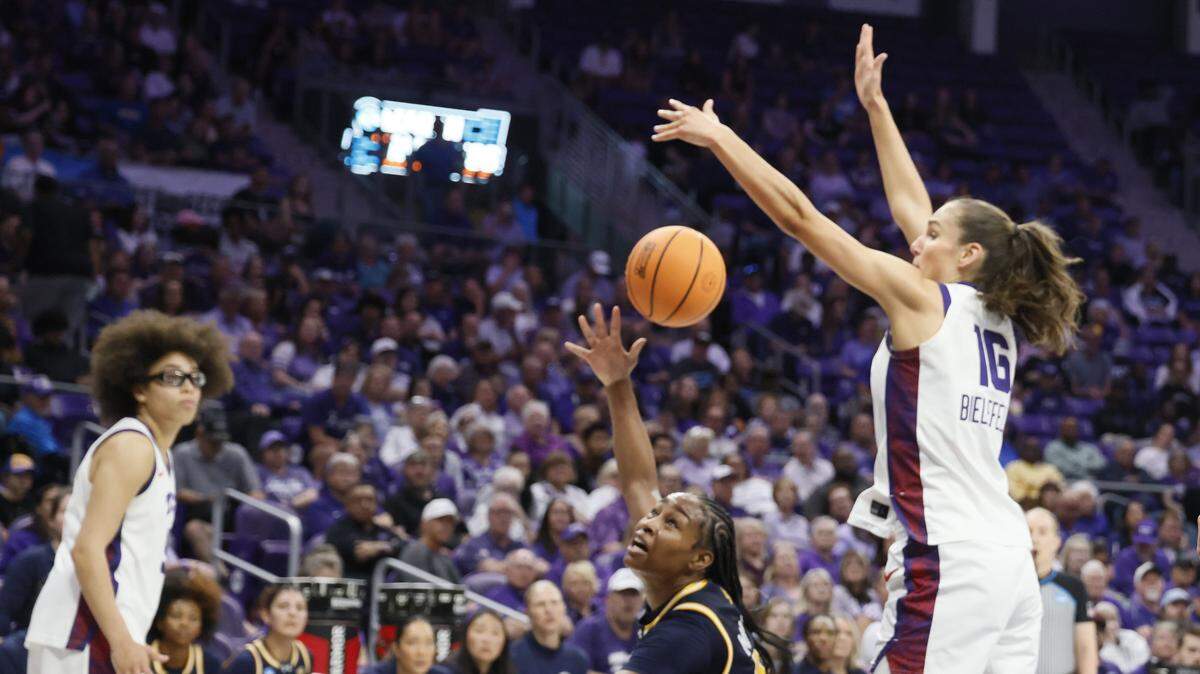TCU guard Clara Bielefeld (16) blocks the shot of UC San Diego guard Dymonique Maxie (10) during the second half of an NCAA Division I Women's Basketball Championship game at Schollmeier Arena in Fort Worth, Texas, Friday, March, 20, 2026.