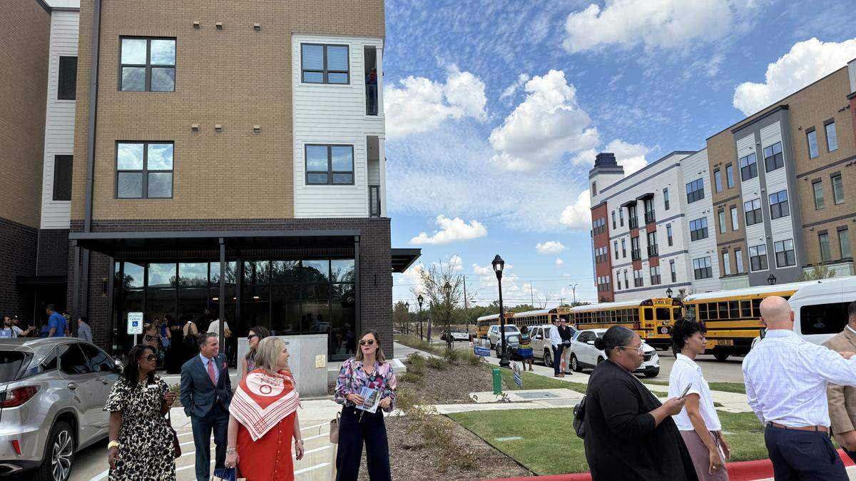 Hughes House features apartment units and multiple common areas, including a playground, meeting room, and computer room, which are available for use by both residents and community members.