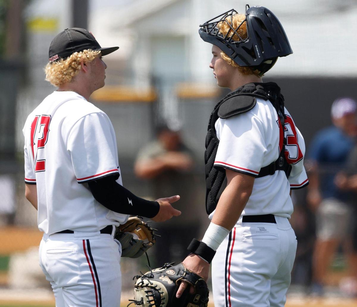 Colleyville Heritage Catcher Logan Rose (13) goes to the mound to talk over the situation with pitcher Andrew Goodman (12) during the UIL baseball regional final 5A D1 playoff game at Hawk Baseball Field in North Richland Hills, Texas, Thursday, May 22, 2025.