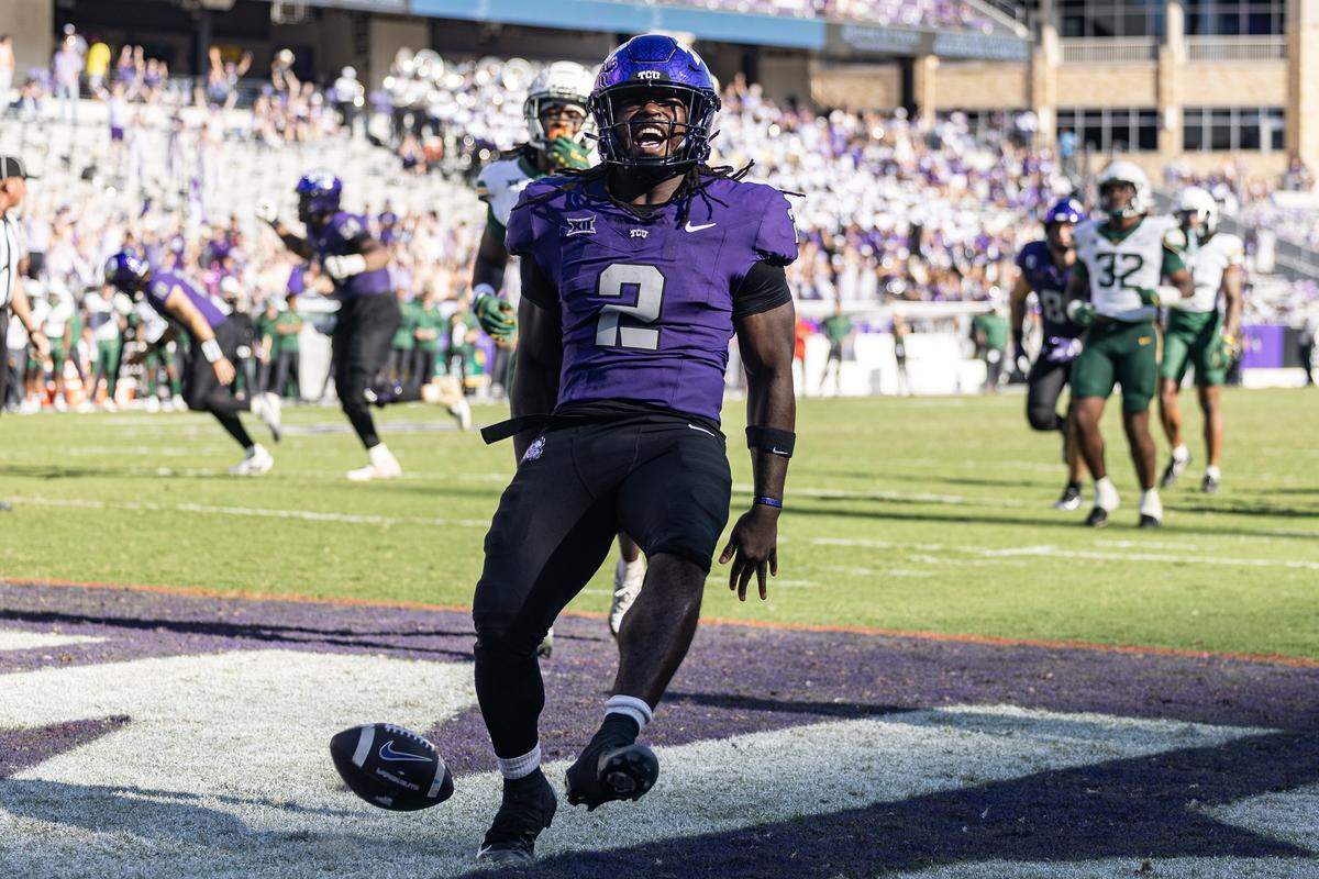 TCU running back Kevorian Barnes (2) rushes in for a touchdown in the second half of a Big XII football game between the TCU Horned Frogs and the Baylor Bears at Amon G Carter Stadium in Fort Worth on Saturday, Oct. 18, 2025.