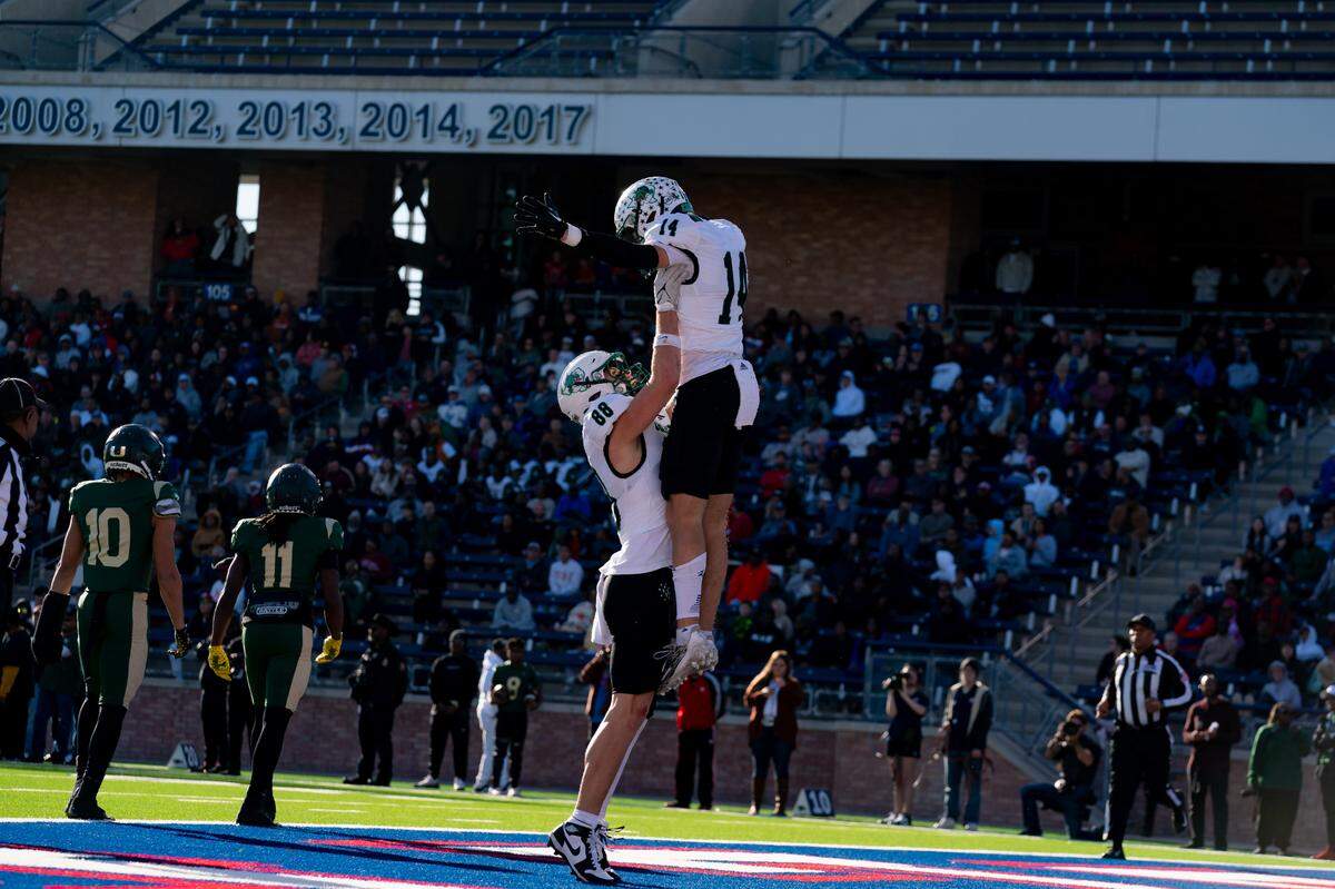 Southlake Carroll tight end Jack Van Dorselaer celebrates with wide receiver Clayton Wayland after a touchdown at Allen Eagle Stadium in Allen, Texas on Dec. 9, 2023.