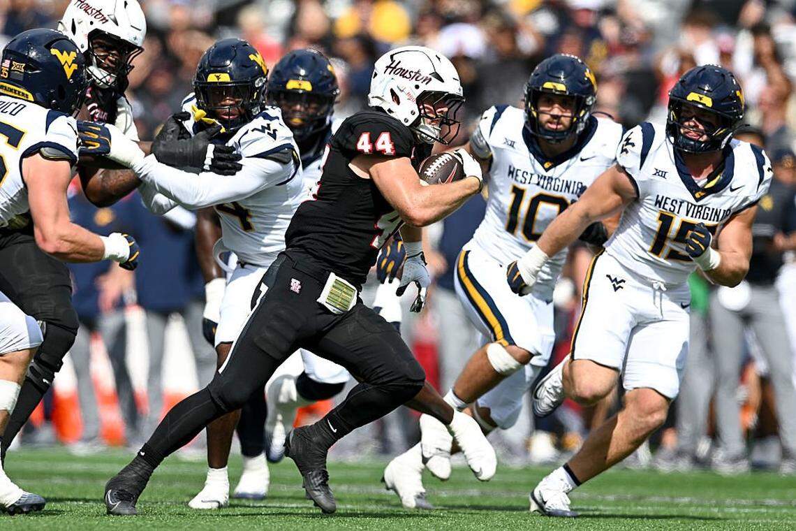 HOUSTON, TEXAS - NOVEMBER 01: Dean Connors #44 of the Houston Cougars runs the ball during the first half against the West Virginia Mountaineers at TDECU Stadium on November 01, 2025 in Houston, Texas. (Photo by Maria Lysaker/Getty Images)