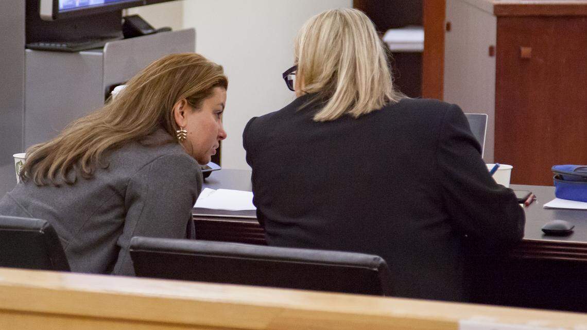 Defendant Desiree Boltos talking with her defense attorney Joetta Keene.