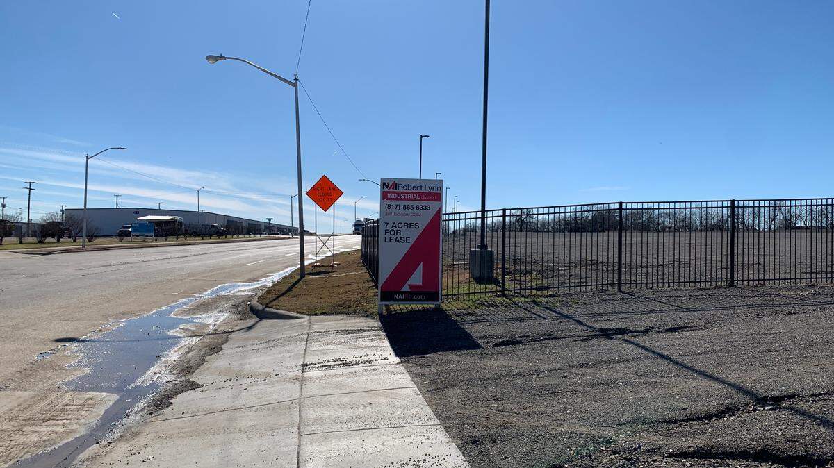 An empty lot on Village Creek Road. The 7-acre patch of gravel was the focal point of a long running dispute between nearby residents and a Dallas-based developer.