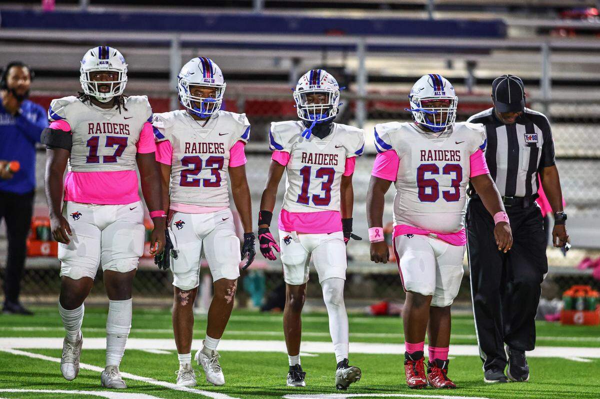 The Fort Worth Southwest captains take the field for the coin toss against Fort Worth Eastern Hill on Thursday, Oct. 17, 2024 at Scarborough-Handley Field in Fort Worth, Texas.