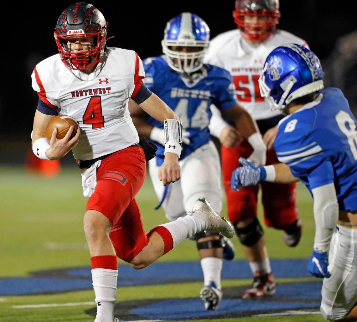 Northwest quarterback Jake Strong (4) runs from the defense of Northwest around the right side in a District 3-5A football game at Bear Stadium in White Settlement, Texas, Friday Oct. 29, 2021. Northwest defeated Brewer 42-17. (Special to the Star-Telegram Bob Booth)