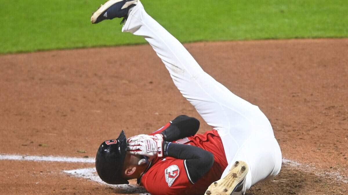 Cleveland Guardians designated hitter David Fry (6) reacts after he was hit in the face by a pitch in the sixth inning against the Detroit Tigers on Tuesday, Sept. 23, 2025, at Progressive Field in Cleveland.