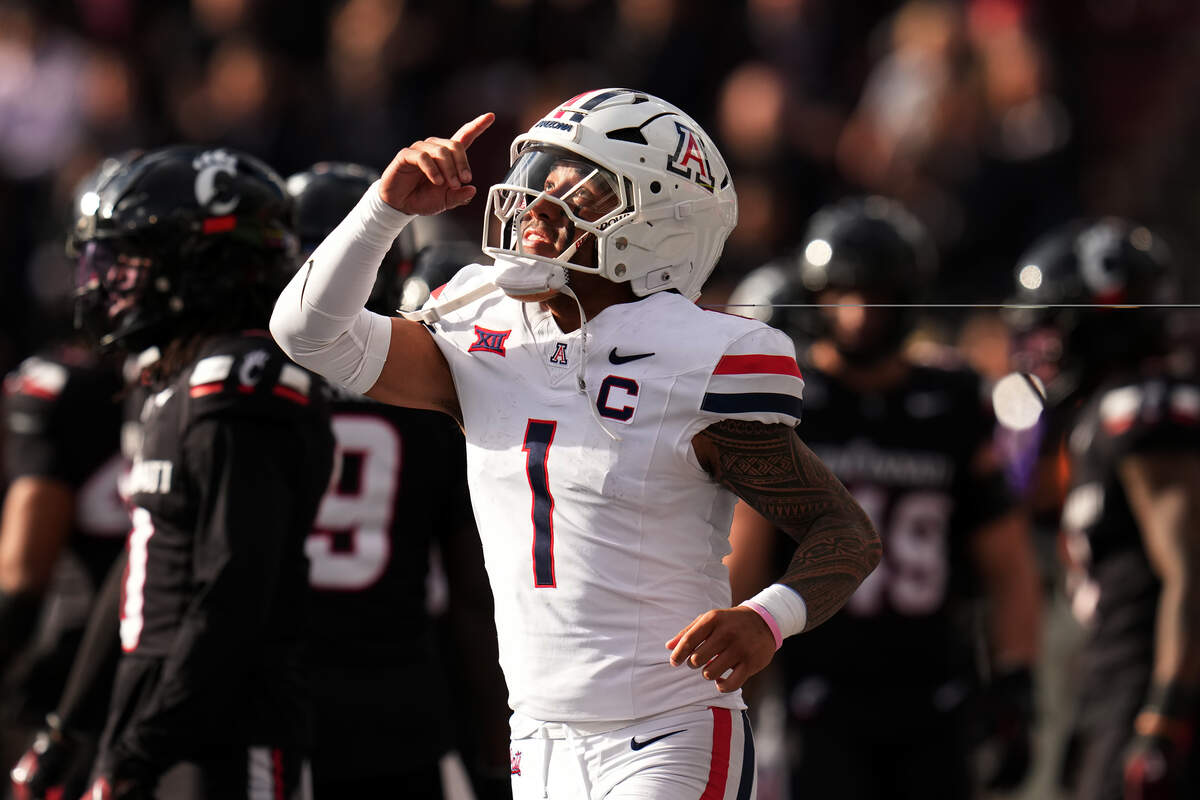 Arizona quarterback Noah Fifita celebrates after throwing a touchdown pass during the fourth quarter against Cincinnati on Nov. 15, 2025, at Nippert Stadium in Cincinnati.