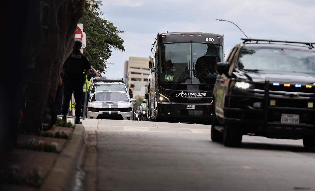 Czechia's national soccer team arrives at the Sheraton Hotel on Commerce Street on Friday in Fort Worth. Fort Worth police officers helped transport the team to the hotel.