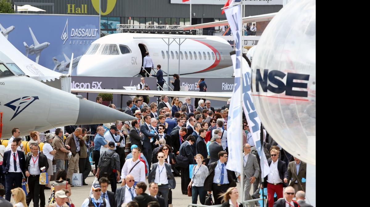 
Visitors crowd the aisles  of the Paris Air Show on Tuesday in Le Bourget, north of Paris.
