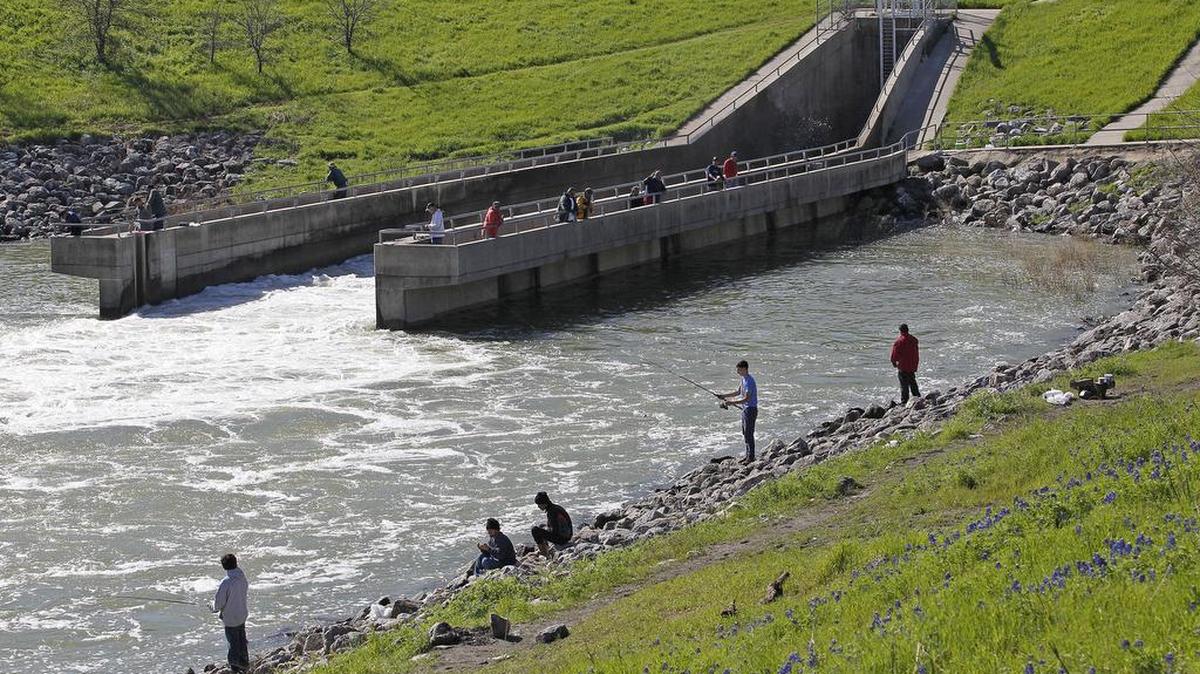 Last month people were fishing near Joe Pool Lake’s dam. Federal officials want to protect the dam by imposing a 4,000 foot no-drilling exclusion zone.