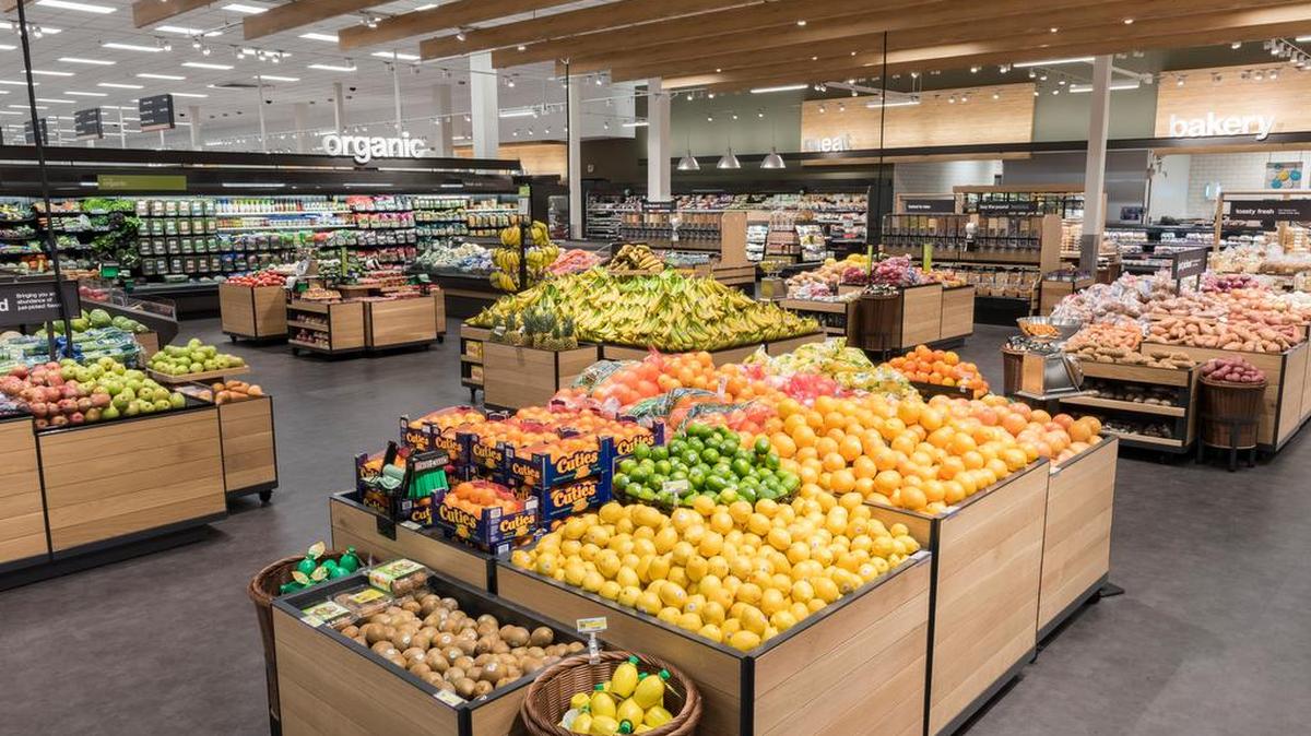 Target is remodeling store produce areas with wood-grain fixtures.