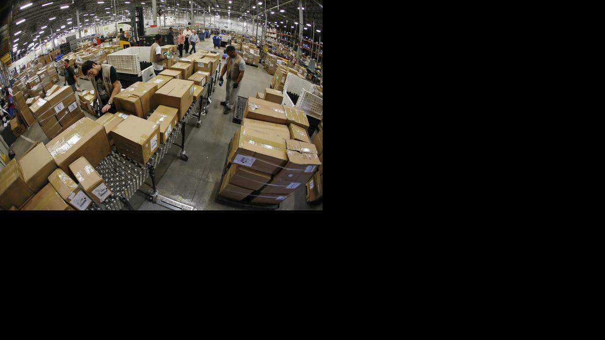 
A non-stop flow of incoming products traded at GameStop stores around the country arrive at GameStop’s giant refurbishment center in Grapevine. 
