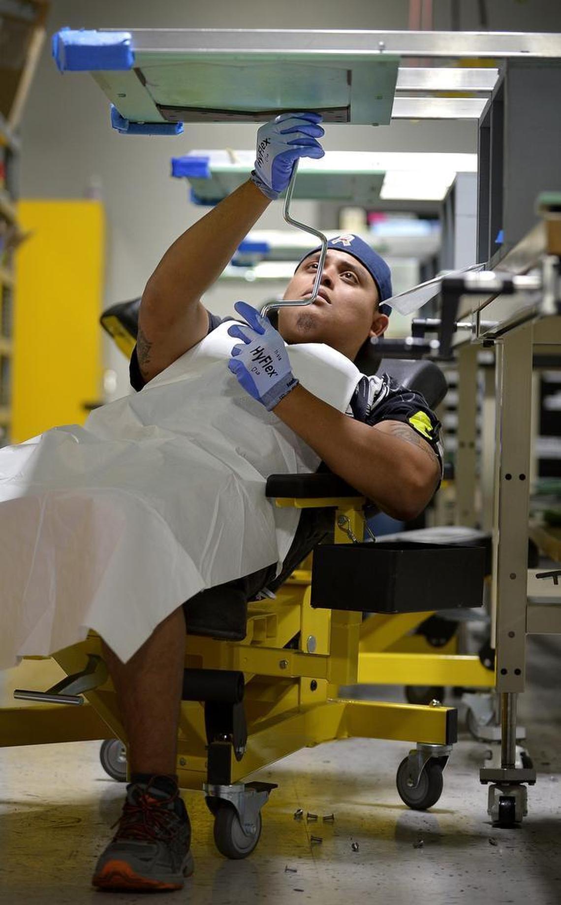 Luis Hernandez is in electrical training for the F-35 at Lockheed Martin Aeronautics. A new training program mirrors working conditions on the factory floor to improve the product.