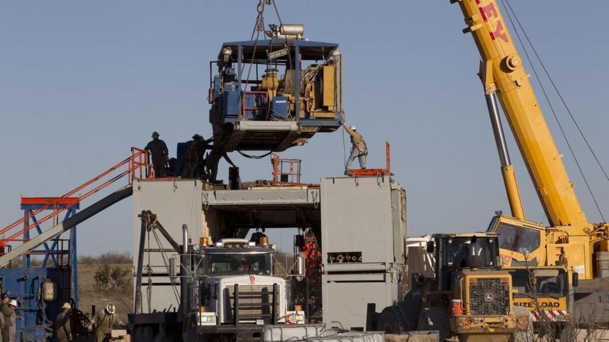 An economist predicts that the steady decline in oil prices could lead to an additional 20,000 jobs lost in the industry by the middle of 2016.