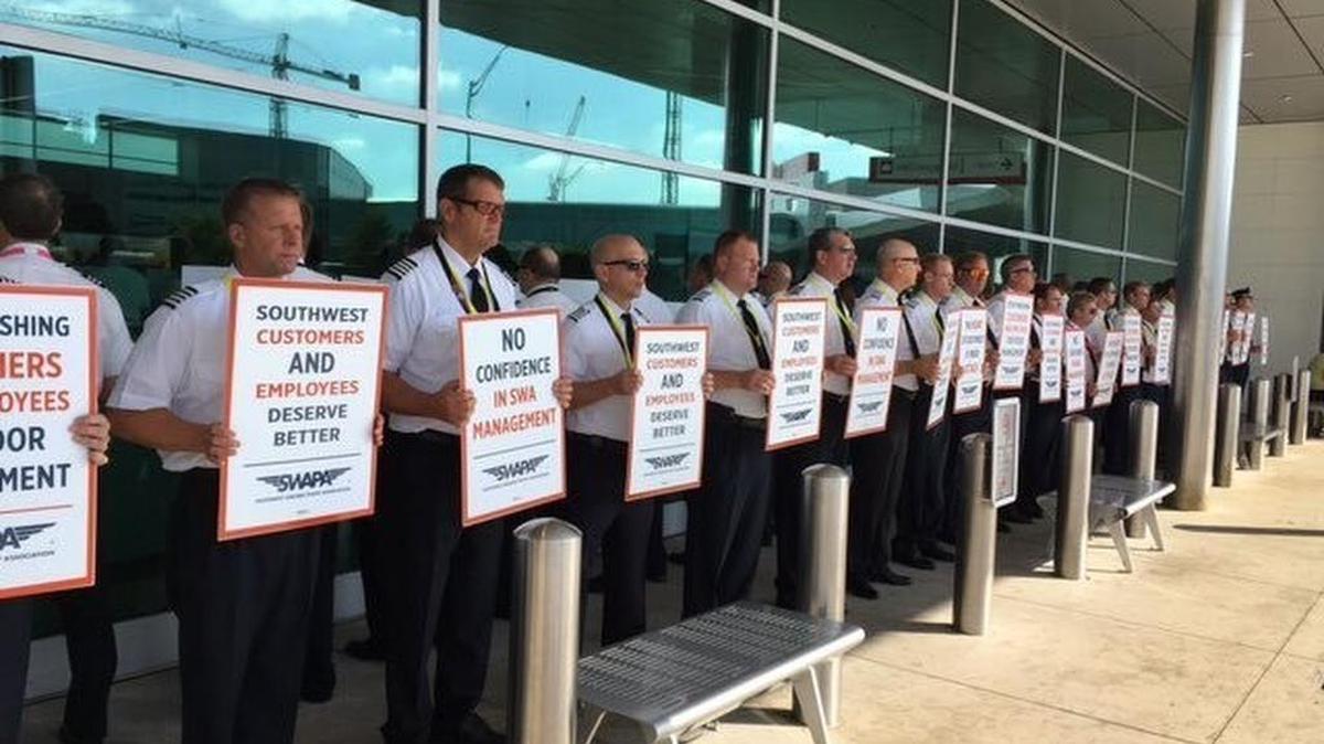 Hundreds of Southwest Airlines pilots picket outside of Dallas Love Field as they have been without a new contract since 2012.