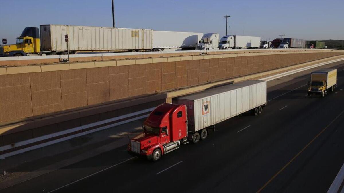 Trucks move along Interstate 35 in Laredo, also known as the Nafta superhighway. Commerce Secretary Wilbur Ross said negotiations to revamp the North American Free Trade Agreement probably won’t start until later this year.