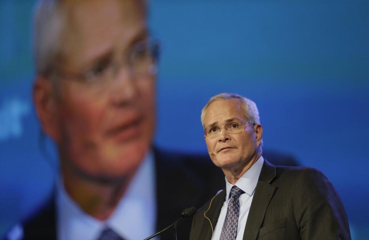 Darren Woods will face challenges on climate change and executive pay on Wednesday while hosting his first shareholders meeting as chairman and CEO at Exxon Mobil.