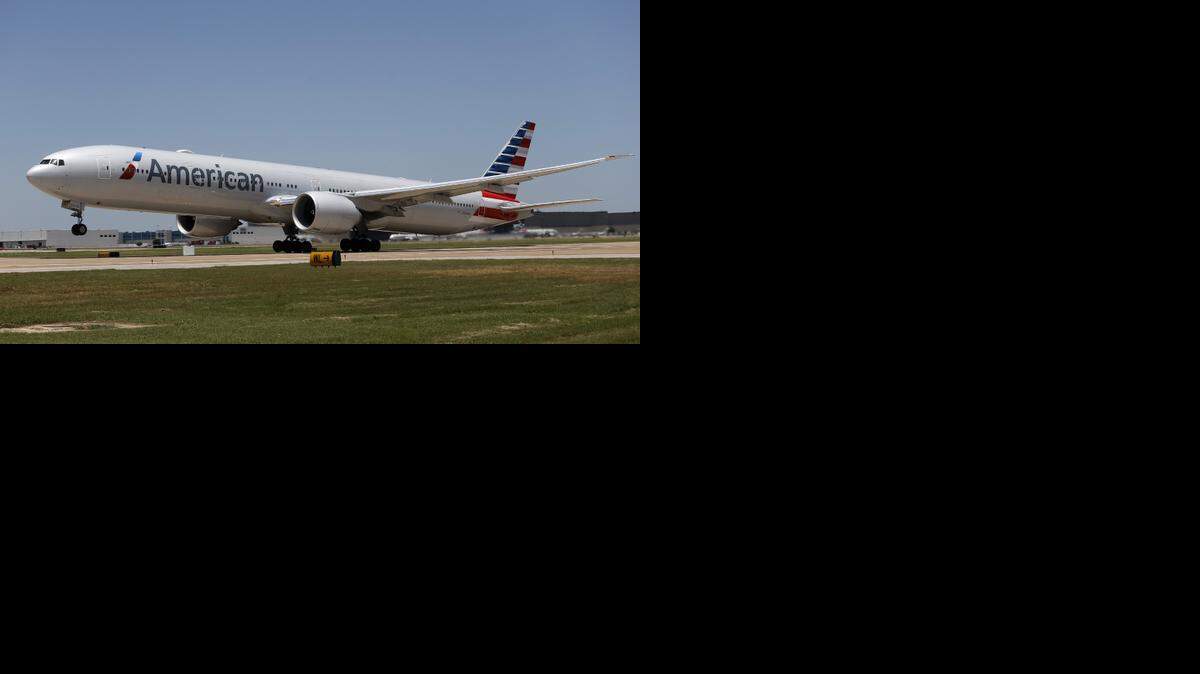 
Local airline stocks soared on Wall Street in 2014. Bankruptcy seems like a distant memory just a year for American Airlines after its merger with US Airways. The Fort Worth-based airline reported record profits ($2.29 billion for the first nine months of the year) and just gave all employees a 4 percent raise. In this photo, a Boeing 777-300 bound for Hong Kong rotates and takes off as American Airlines inaugurates new direct service to Hong Kong from DFW International Airport in June. 
