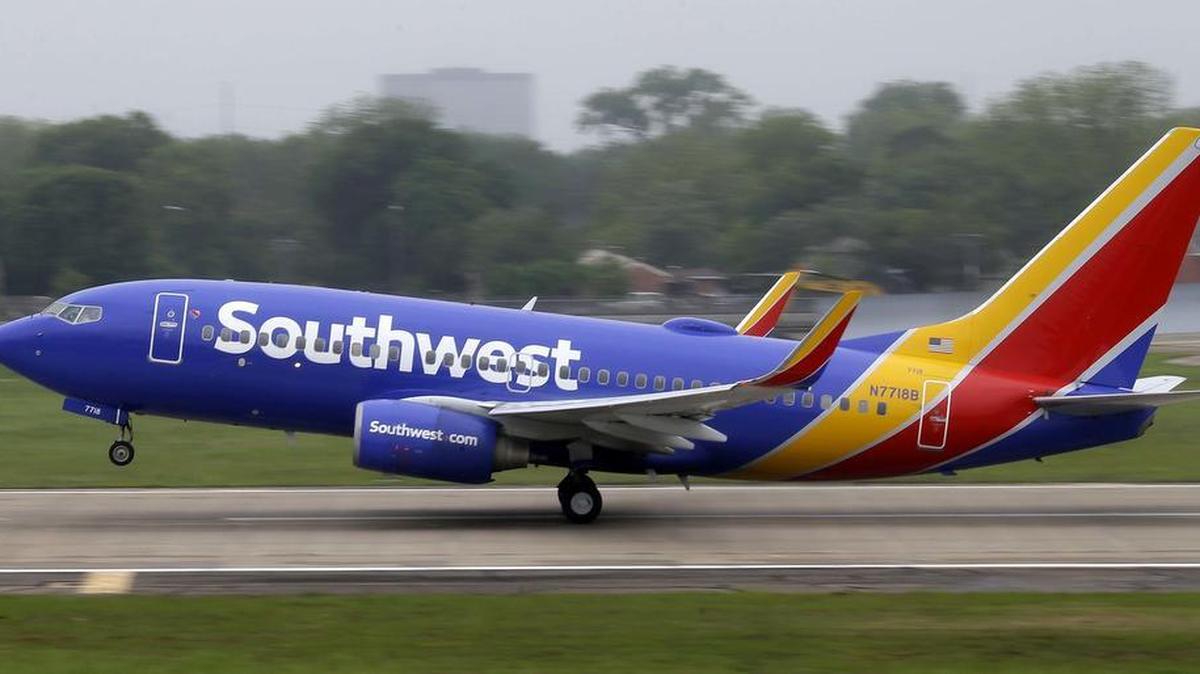 A Southwest Airlines jet takes off from a runway at Love Field in Dallas on April 23, 2015.