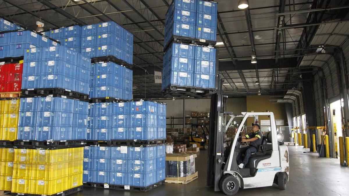 Crates of U.S. manufactured parts are prepared for shipment into Mexico at Freight Dispatch Service Agency in Pharr. Texas-based business groups have formed a coalition to work towards maintaining strong trade ties with Mexico.
