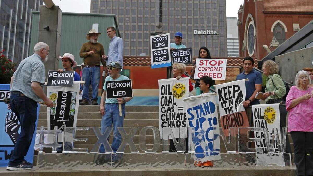 Exxon Mobil shareholders meetings in Dallas typically attract a range of protesters, such as these people who gathered at the Morton H. Meyerson Symphony Center last year.
