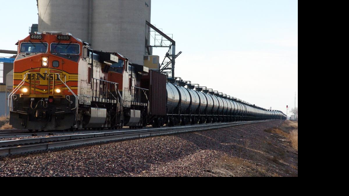 
In this file photo, a BNSF Railway train hauls crude oil near Wolf Point, Mont. Fort Worth-based BNSF, the largest U.S. crude-by-rail carrier, is offering lower rates to lug oil in cars that meet the latest federal specifications issued in May. 


