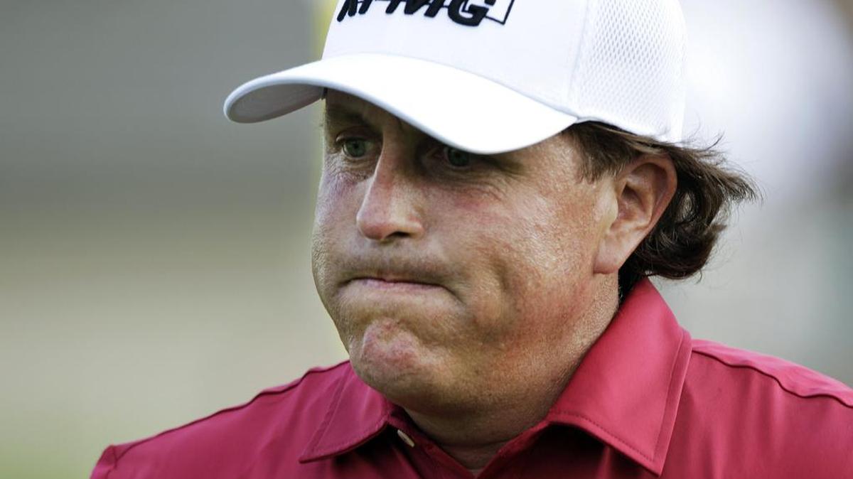 The Securities and Exchange Commission asked pro golfer Phil Mickelson to return proceeds from transactions involving Dean Foods stock. Dean’s former chairman and a Las Vegas gambler were indicted.