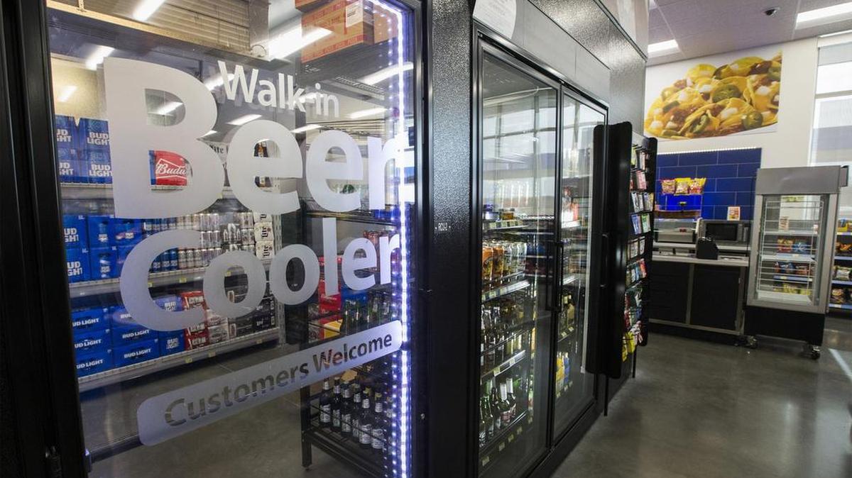 A walk-in beer cooler inside a new Walmart convenience store on FM 1187 in Crowley,.