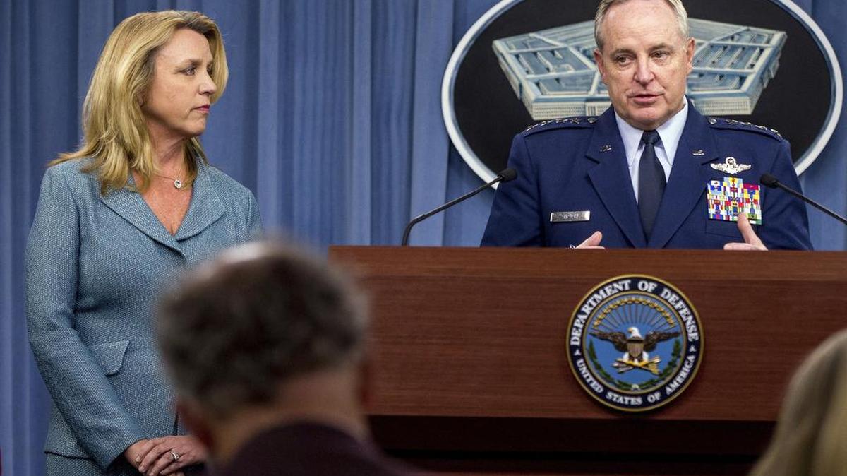 Air Force Chief of Staff Gen. Mark Welsh III, accompanied by Air Force Secretary Deborah Lee James, left, speaks announcing that Northrop Grumman is being awarded the next-generation long-range strike bomber contract.