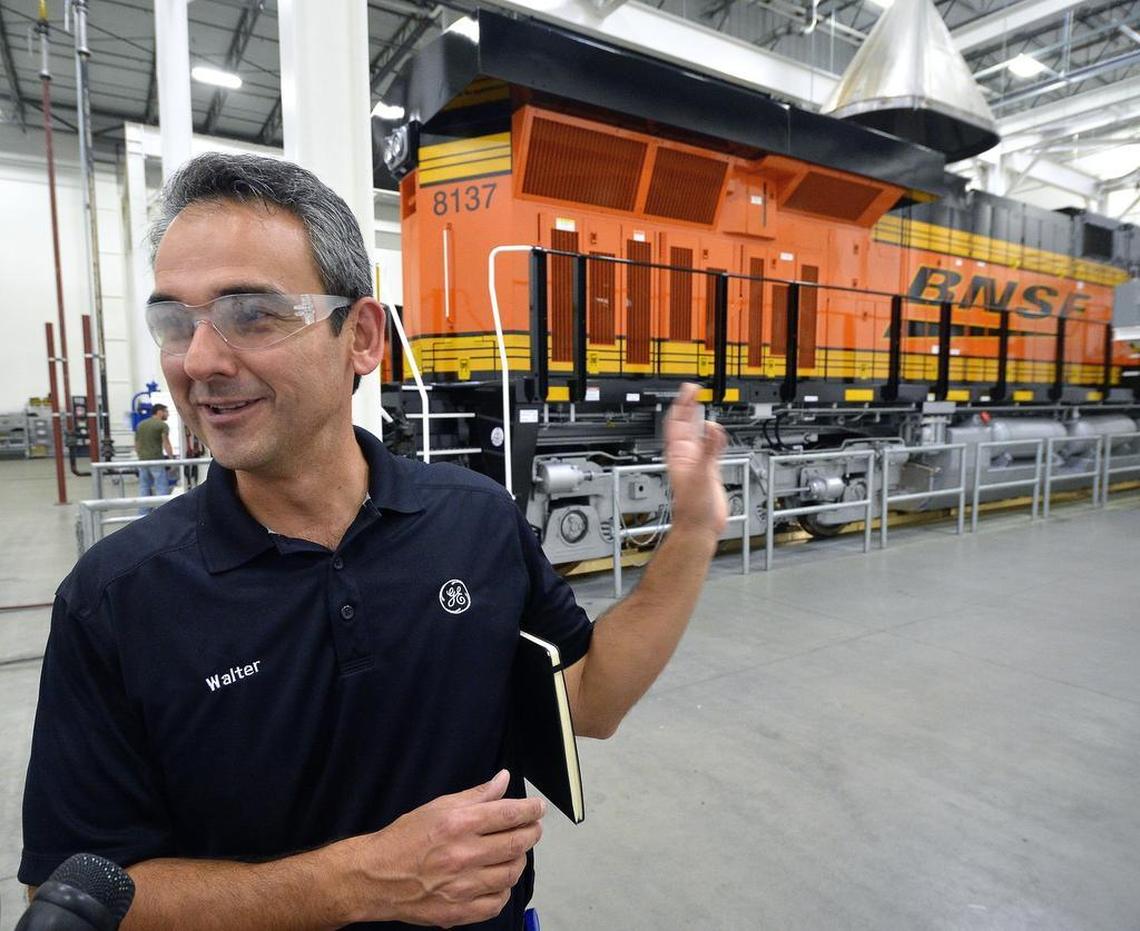 GE Transportation plant manager Walter Amaya gives a tour of the GE locomotive plant in Fort Worth 2014.