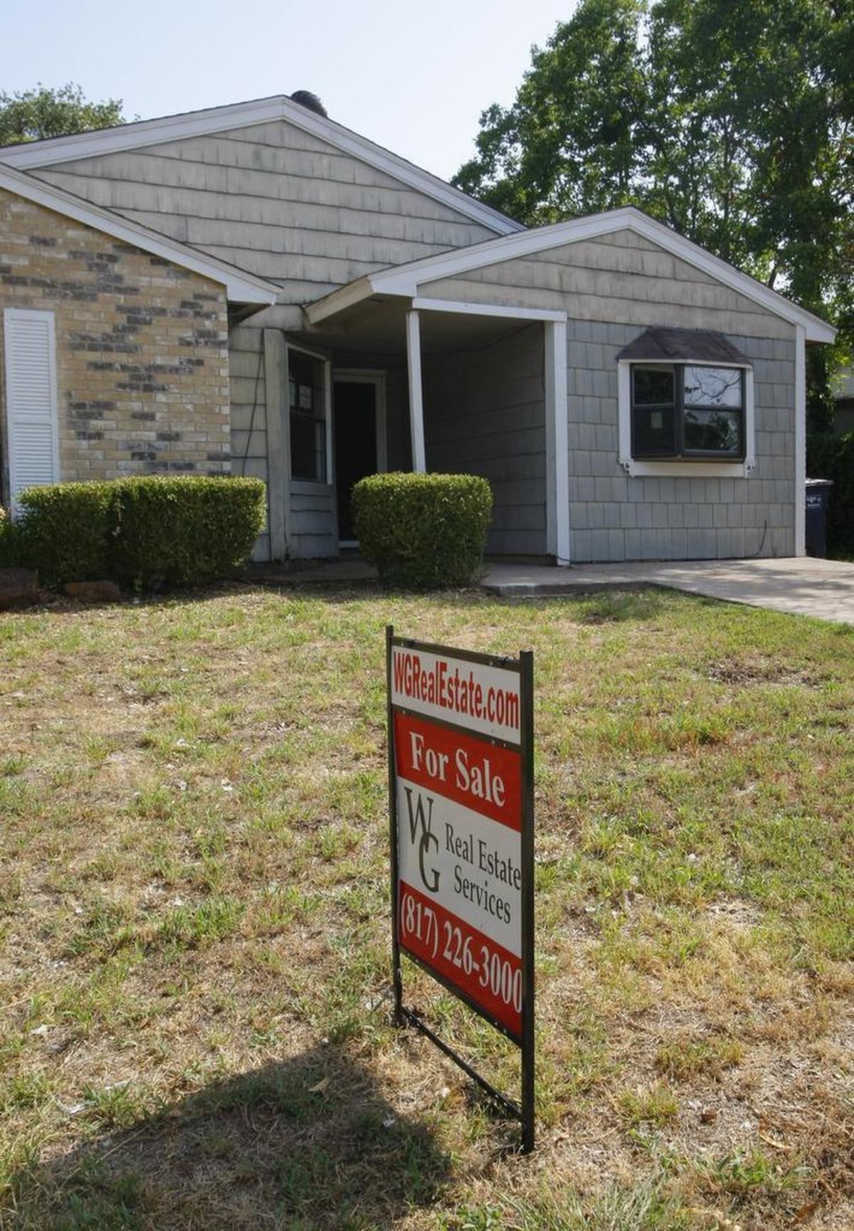 A foreclosed home for sale in 2009 in the 7700 block of Portman in east Fort Worth.