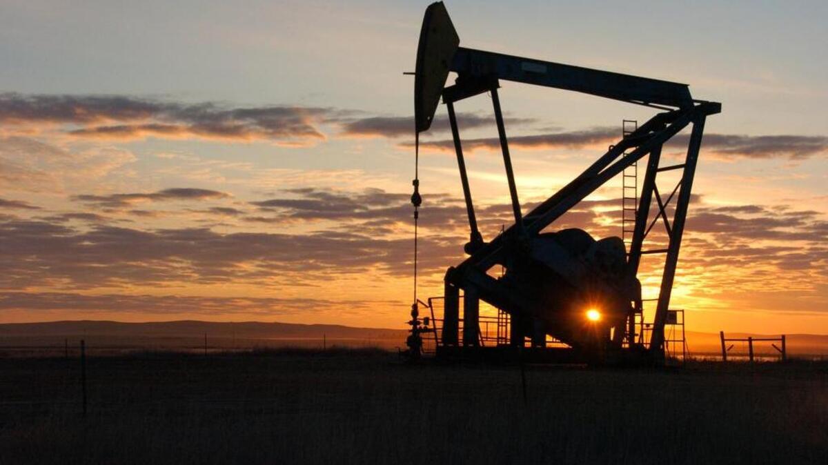 
The Bakken oil boom drew hordes of job seekers and international attention to the remote prairies of North Dakota and Montana, creating demands for services local governments find hard to meet. This is a pump jack near Bainville, Mont.


