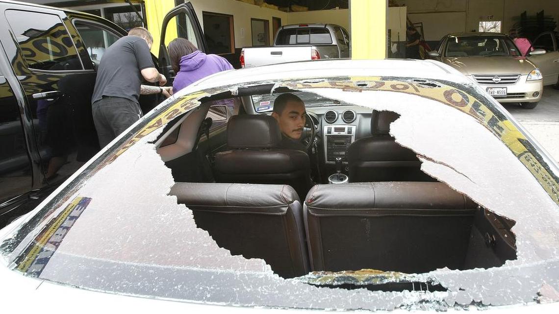 Hail demolished the back window out of this vehicle during a storm in west Fort Worth on March 17.