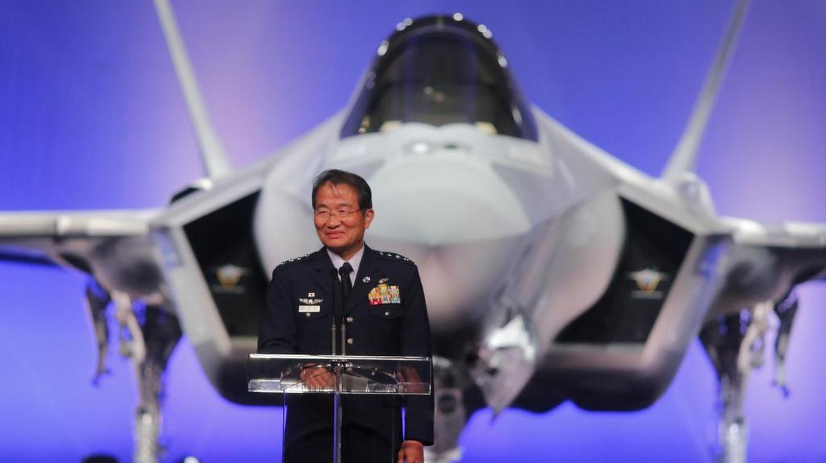 General Yoshiyuki Sugiyama, chief of staff for the Japan Air Self-Defense Force, speaks as Lockheed Martin rolls out the first F-35 fighter jet built for Japan in September.
