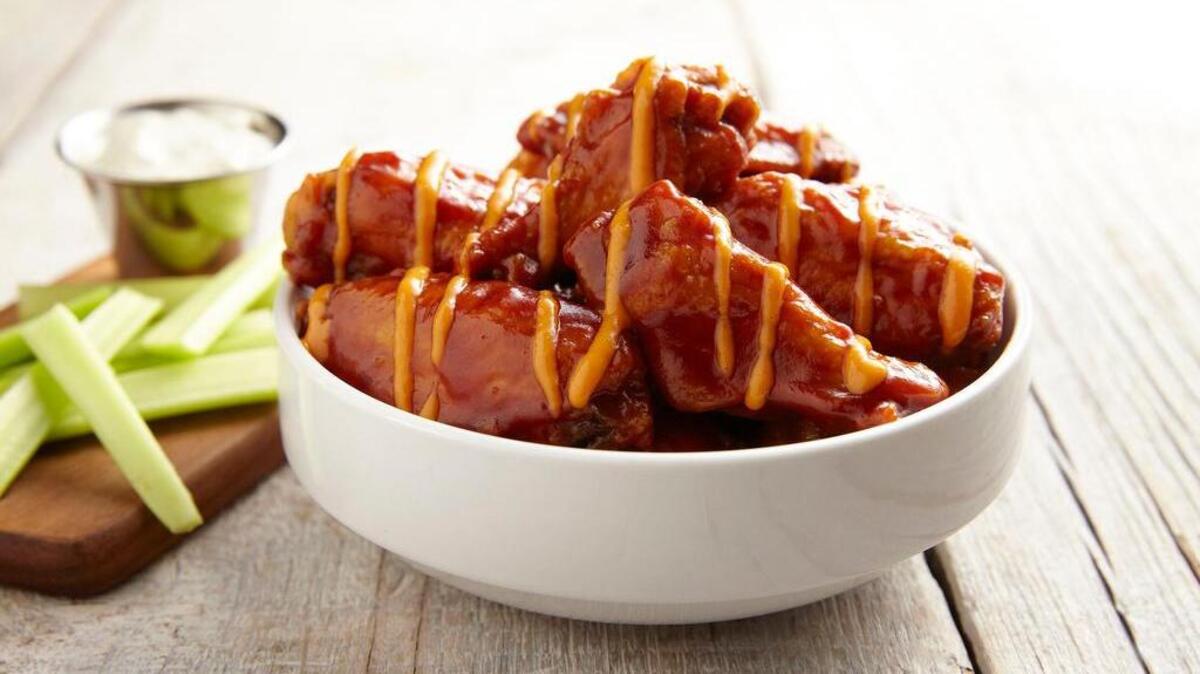 Buffalo Wings & Rings offers deep-fried chicken wings in 15 flavors and several “heat” levels.