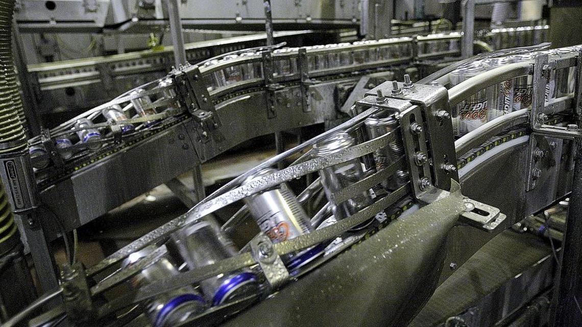If the U.S. does impose import duties on primary aluminum, it will affect the roughly 5,000 brewers scattered across the country. Here cans move along the production line at MillerCoors Brewery in Fort Worth.