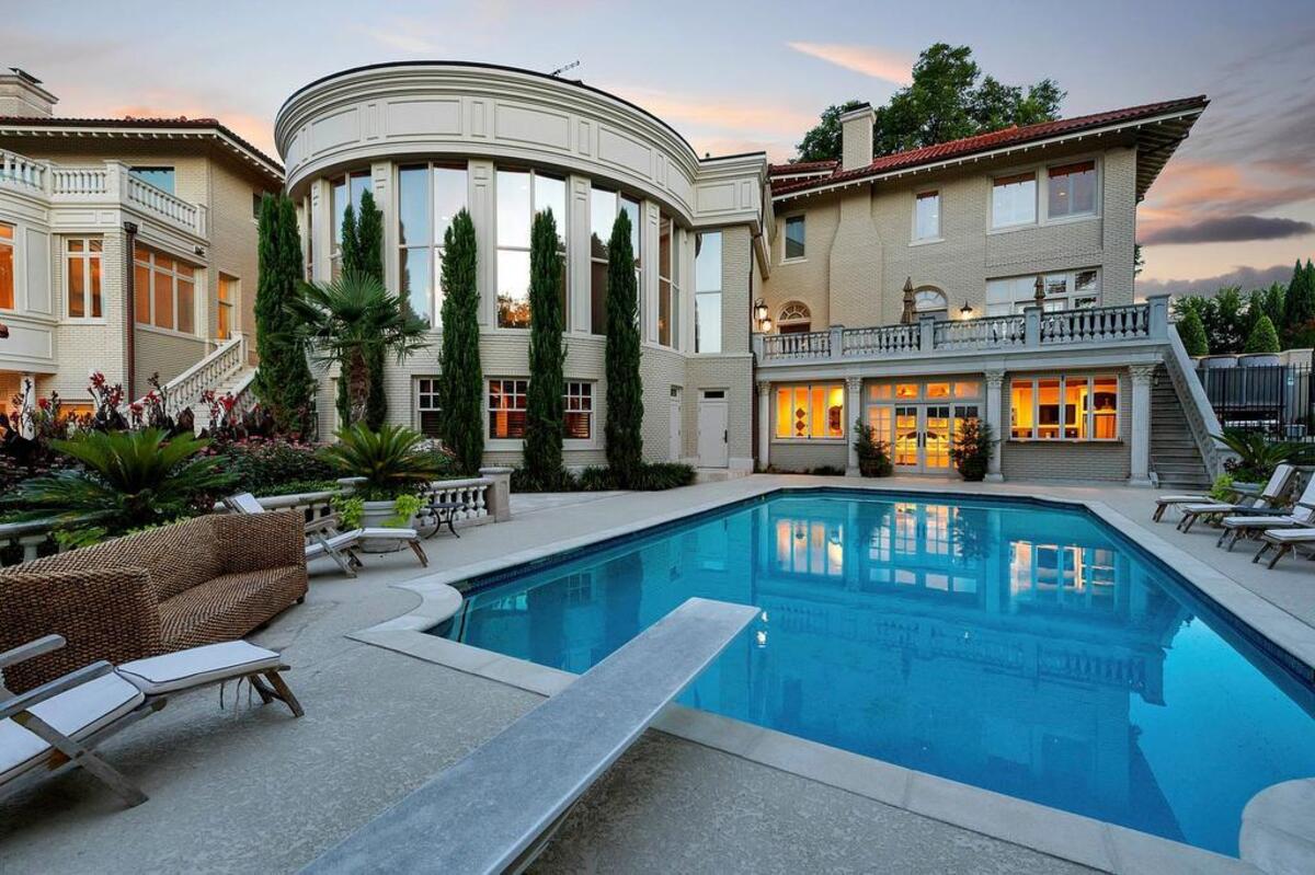 The pool area with cabanas at the Baldridge Estate in Fort Worth.